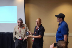 Frank O\'Laughlin, WQ1O, receiving an award for his dedicated service to the ARES community