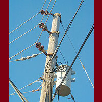 photo of power pole, wires, and transformer