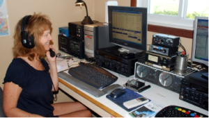 Woman operating radio