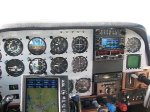 photo of a cockpit of a small plane