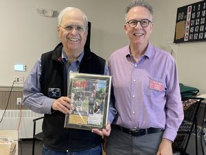 W1IS (left) receiving QST cover plaque for An All-Band 160-Meter OCF Antenna in the August 2025 issue.
